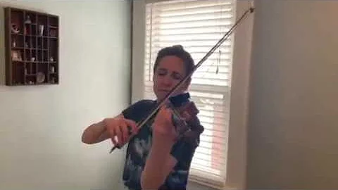 Acting concertmaster, Debbie Buck plays a bit from...