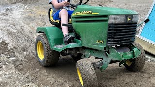Making bike jumps with a mower and mini ex!