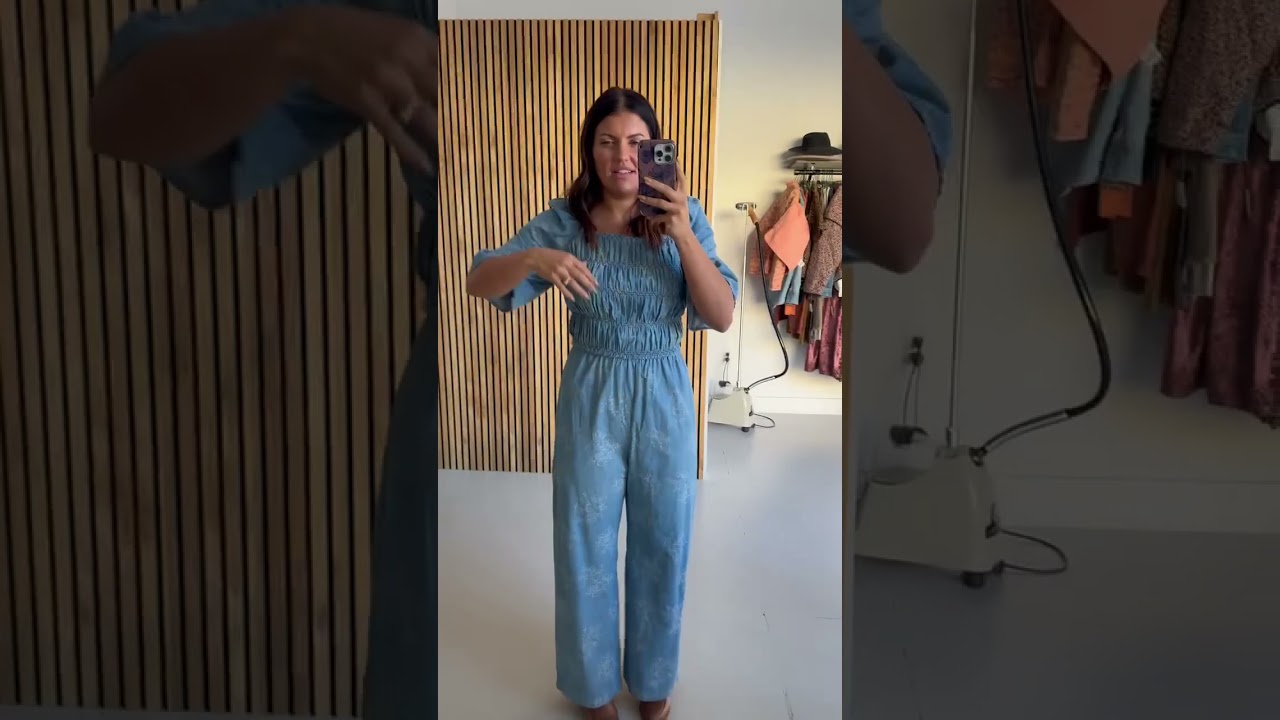 The Quintana Smocked Floral Jumpsuit in Denim