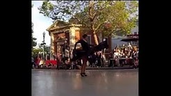 A dancer performing a flamenco nuevo on the street.
