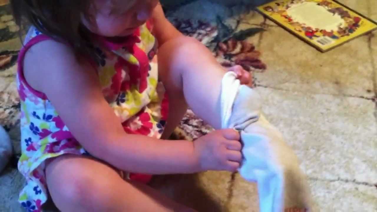 Toddler having a meltdown trying to put on socks YouTube
