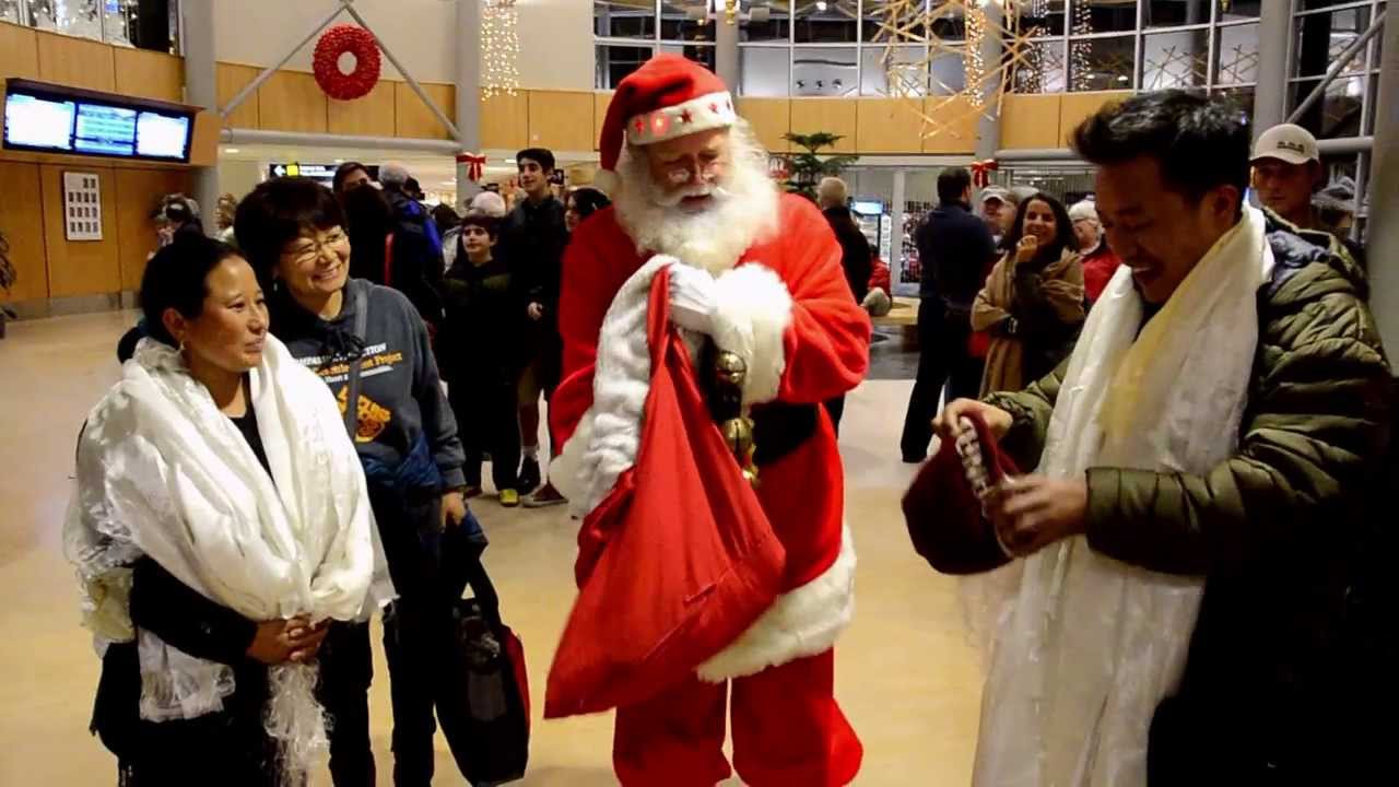 Tibetan Refugees arrival at Victoria International Airport, with Santa Claus, Dec., 2013.
