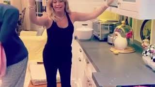 Goldie Hawn Dancing While washing Dishes.