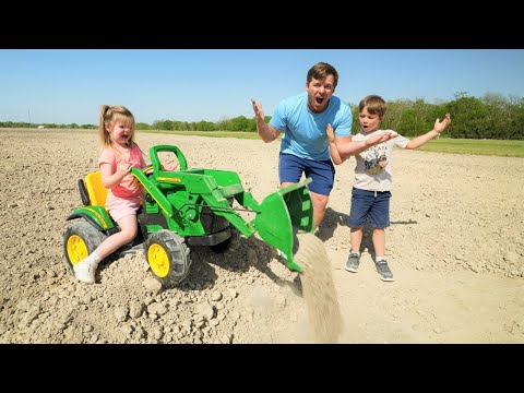 Using our kids tractors to dig dirt and save a stuck real tractor | Tractors for kids