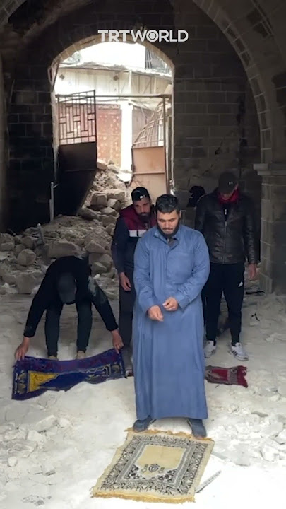 Palestinian imam recites Islamic call to prayer at Gaza's Great Omari Mosque