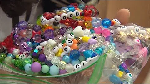 Swifties trading friendship bracelets, 'Taylor-gating' before tonight's concert