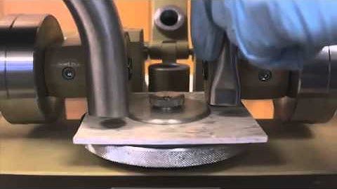 Abrasion Test with TABER Grit Feeder