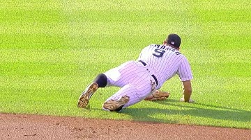 NYM@COL: LeMahieu makes sliding stop and toss for out