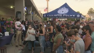 Thousands gathered for a vigil to honor late Officer Angela Santiago