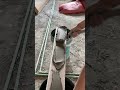 the process of installing long ceramic tiles on the door frame wall between rooms in a building