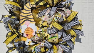 Bee Gnome, lots of bows. #wreathmaking #bees #gnomes #ribbon #wreath