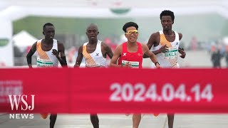 Beijing Marathon Footage Appears to Show Chinese Runner Allowed to Win | WSJ News