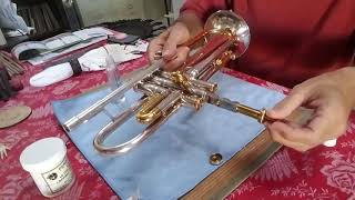 Pete Estabrook demonstrates how to lap a trumpet valve.