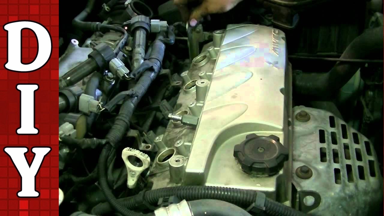 Как снять и заменить прокладку клапанной крышки на Mitsubishi Oulander 2006 года с двигателем 2,4 л
