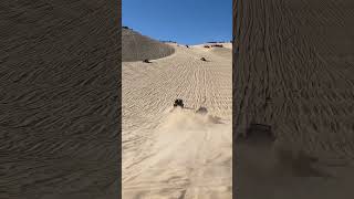 Turbo V8 Sandrail flying up Oldsmobile hill in Glamis CA