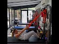 Travail des bras sur machine de Pilates Cadillac + sangles TRX