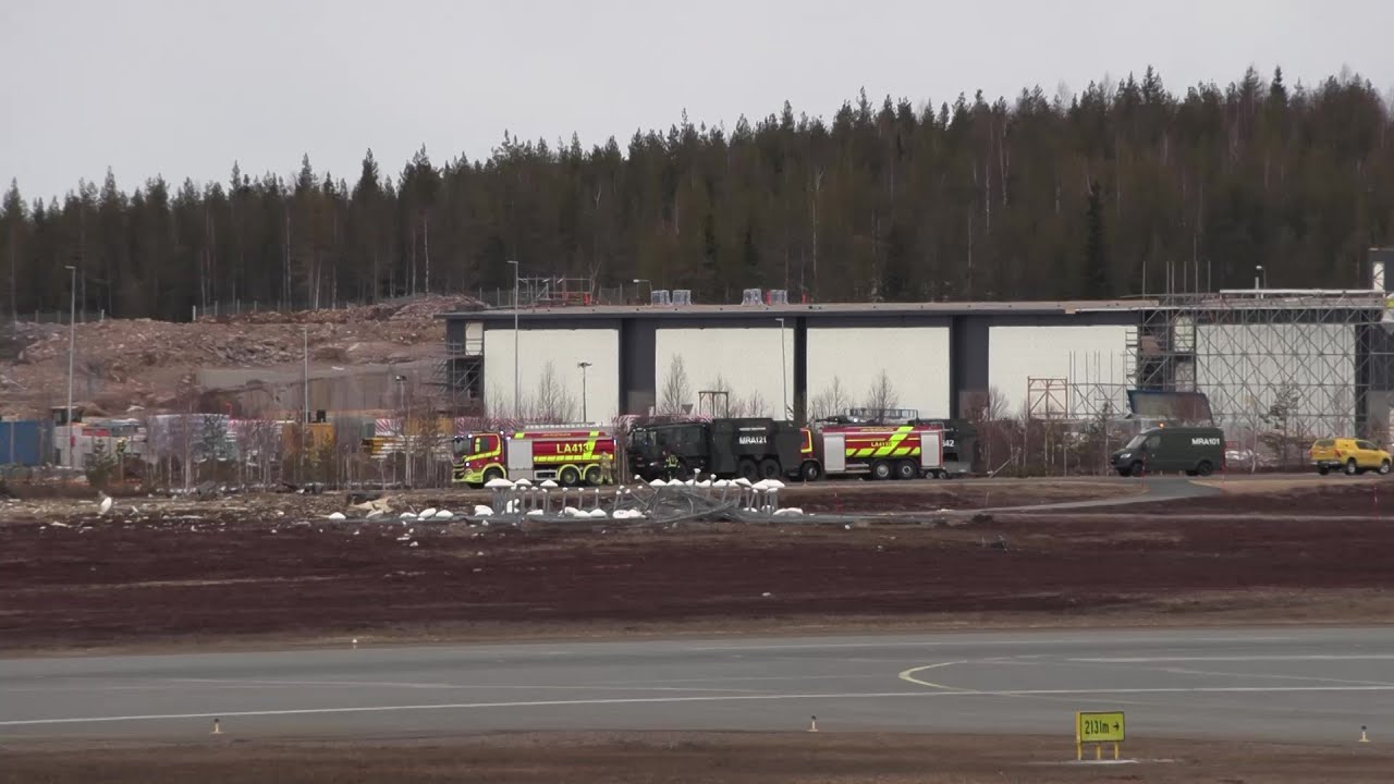 Emergency vehicles on site after Finnish fighter jet crashes in Arctic town | AFP