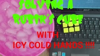 Solving the Rubik's Cube with frozen hands !