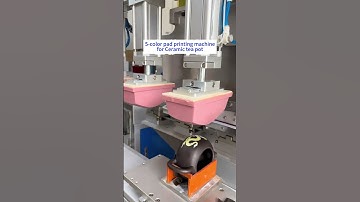 Four-color pad printing machine for ceramic tea pot.