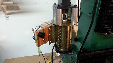 I built a Z-Axis motor for the Grizzly G0761 (RF45) milling machine from free treadmill parts.