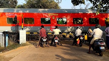 Rajdhani Express Thrashes a Railroad Level Crossing