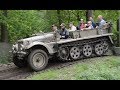 A group of Sd.Kfz 10 driving through the wood