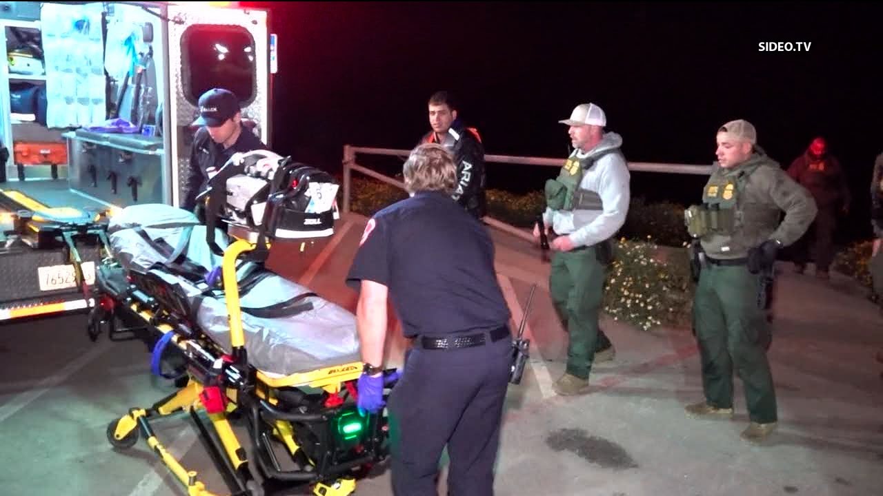 Surfers and San Diego lifeguards rescue man from water near Sunset ...