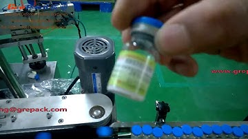 High speed self-adhesive labeling machine for vials