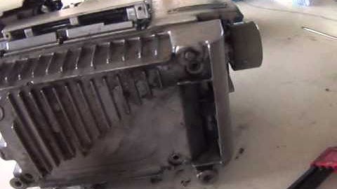 how to service sewing machine overlock-4 removing the base- Suresh Lakshman