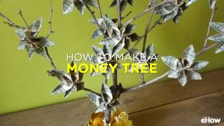 Money trees are tabletop branch arrangements decorated with dollar
bills folded into floral shapes. they make great gifts for birthdays,
graduations, wedding...