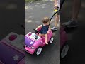 Lily Bean Riding in Her Pink  Car