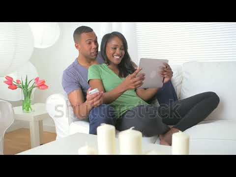 black couple sharing information on their  leptop #share#video