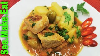 Leek stew with potatoes, olives and pork chops. Easy to make recipe.