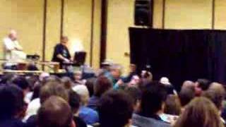 Sylvester McCoy playing the spoons