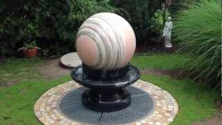 Floating granite spheres