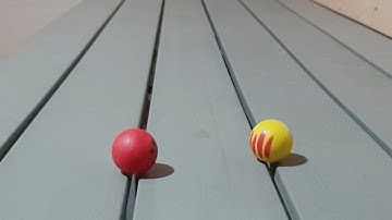Satisfying marble run Balls rolling on the table and down the slope with obstacles