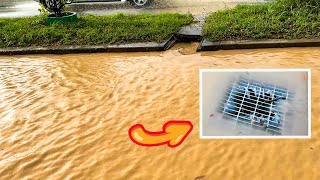 Stucking Drain Flood On Street Road