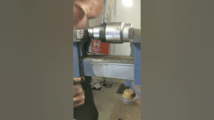 pressing suspension bush out using a vice. rear ca...