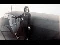 ATA pilot Jackie Moggridge with Hotwater bottle and a Wellington Bomber