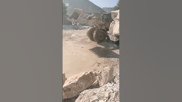Arranging and unloading Marble stone through loader in Marble Factory