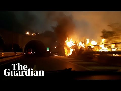 Motorist captures highway in Palermo engulfed in flames as wildfires hit southern Italy