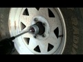 Comment graisser les roulements de roue de remorque avec ez lube grease cert