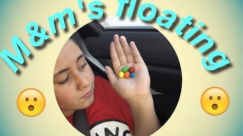 Science experiment: M&M floating