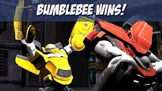 Luchando en videojuego Transformers Battle Masters con Optimus Prime y Bumblebee en Español