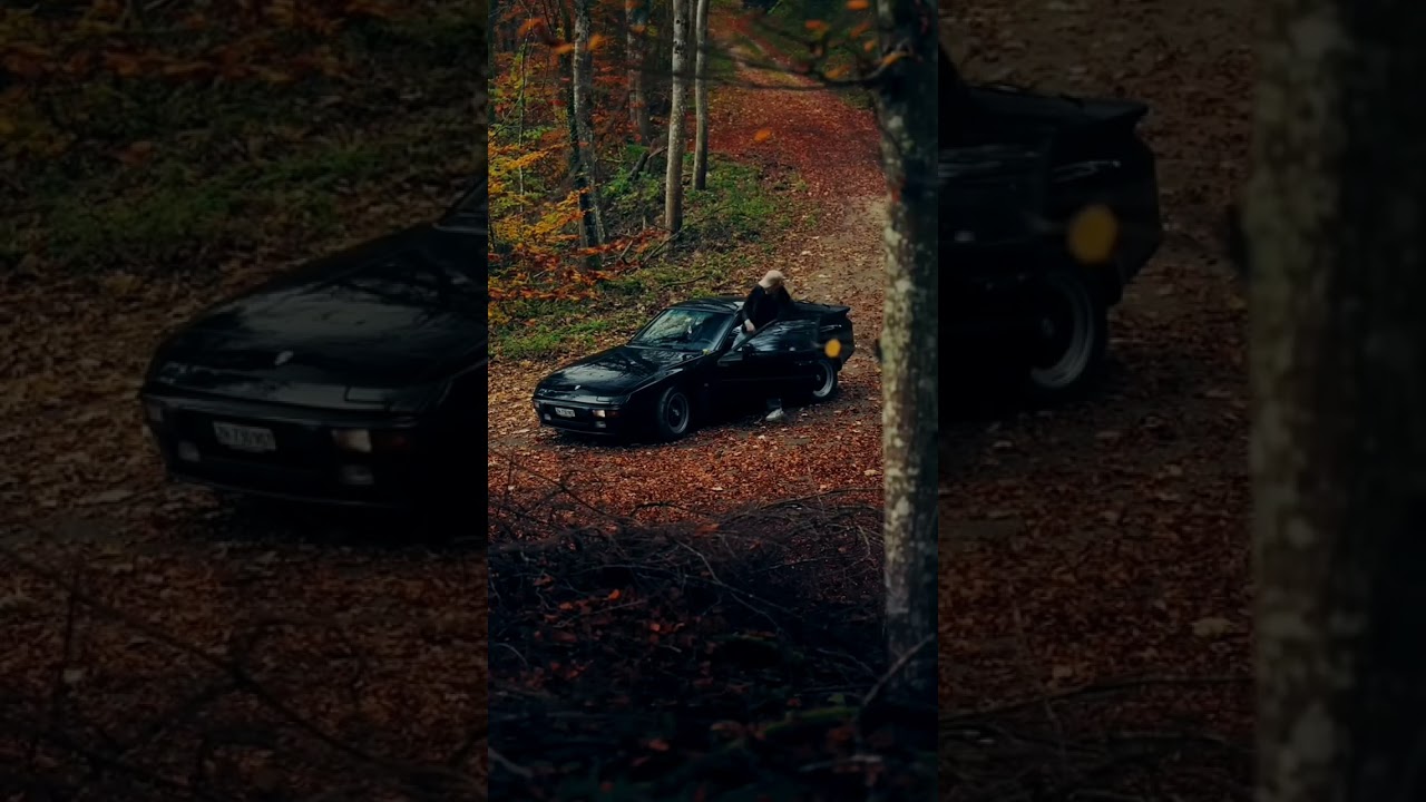 POV: A classic Porche with pop up lights in canadian forest .......