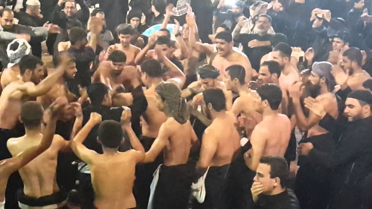 تحت الامطار الغزيره وخدام الحسين يستمرون في احياء الشعائر (هيئه شباب شارع المدينه النجف الاشرف 1437