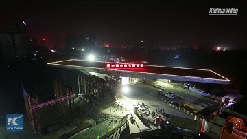 Swiveling bridge turns 100 degrees in 100 minutes, in Wuhan, China
