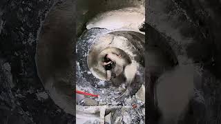 Crawling Inside A Cement Mixer Truck To Clean Out Hardened Concrete Chunks.