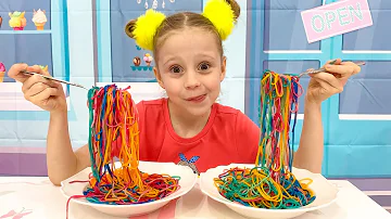 Nastya and Papa are preparing colored noodles