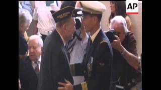 France bestowed its highest honor Thursday upon 23 men who fought World War II's most epic battles a
